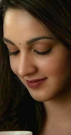 Kiara Advani Close-Up Portrait With Soft Smile And Downcast Eyes HD phone wallpaper