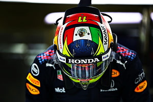 Sergio Perez Red Bull Racing Helmet Close-Up with Honda and Mexican Flag Design HD wallpaper