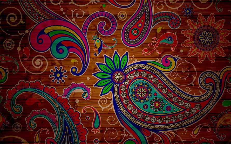 Vibrant Multicolored Paisley and Floral Motifs on Rustic Wood Grain Background HD wallpaper