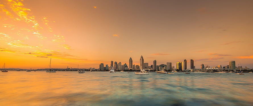 Perth City Skyline at Golden Hour with Yachts on the Water HD wallpaper