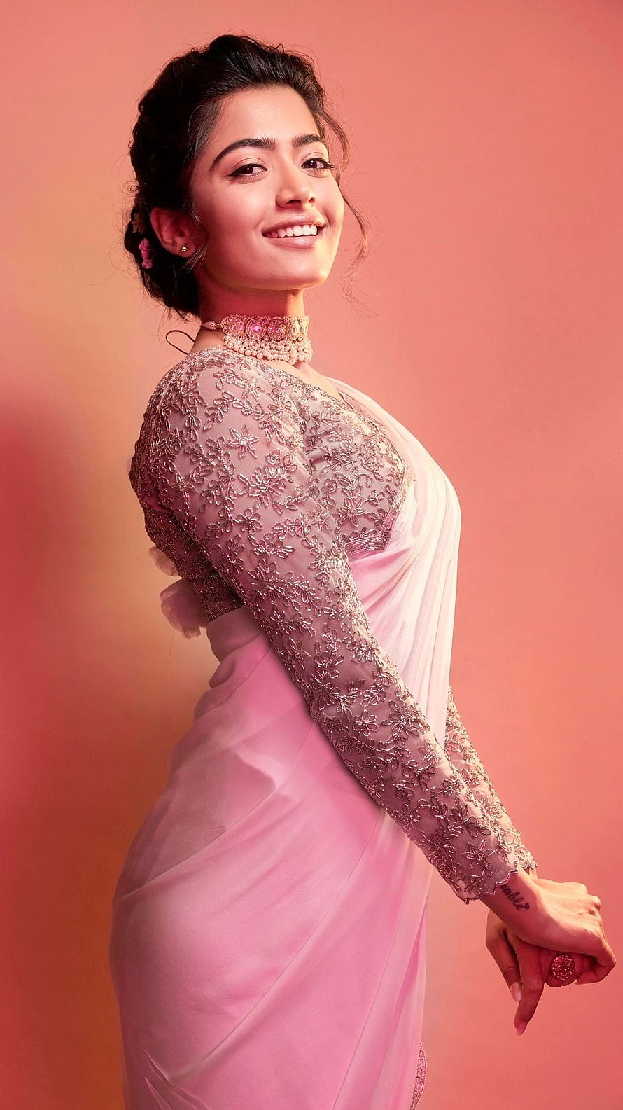 Rashmika Mandanna in Elegant Pink Saree with Embroidered Blouse and Pearl Necklace HD phone wallpaper