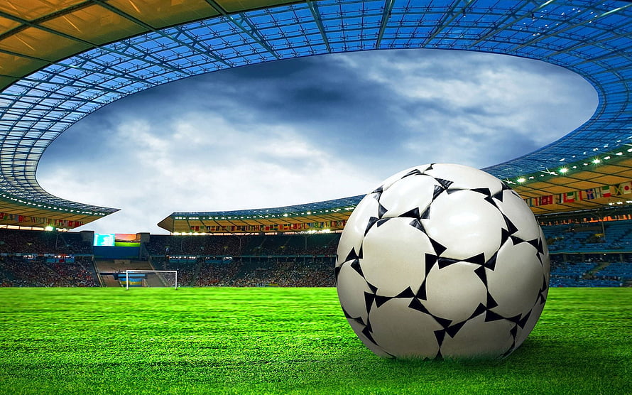 Soccer Ball on Green Pitch Inside a Large Stadium with Star Pattern Design HD wallpaper