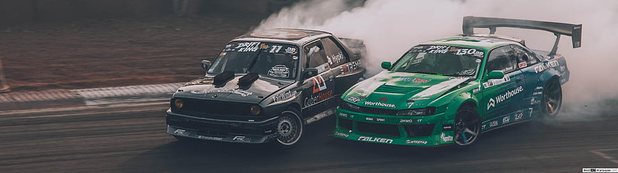 Two Modified JDM Racing Cars Drifting Side by Side on a Track HD wallpaper