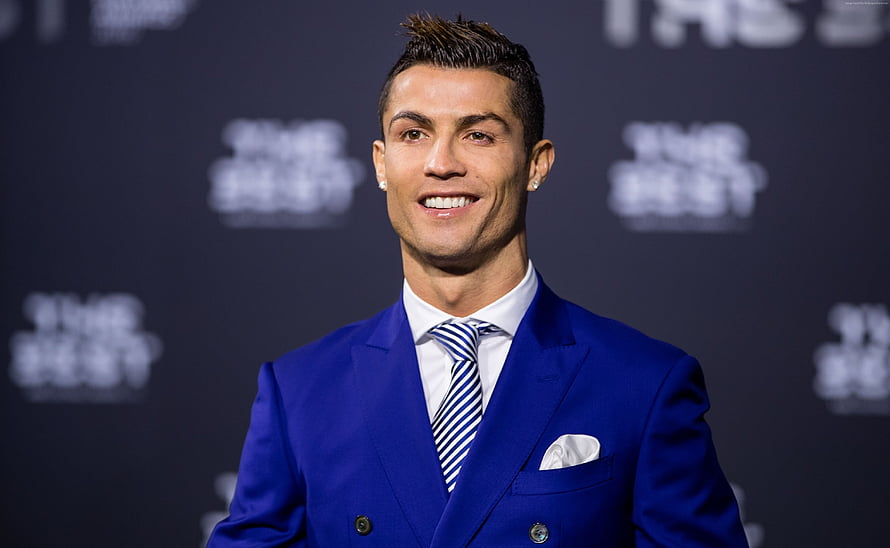 Cristiano Ronaldo in a Royal Blue Suit at a Formal Event HD wallpaper