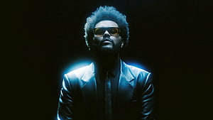The Weeknd in Dramatic Blue Lighting Wearing Sunglasses and Leather Jacket HD wallpaper