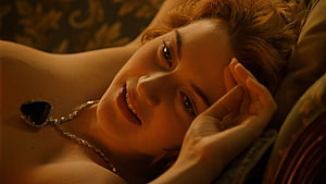 Kate Winslet as Rose DeWitt Bukater in Titanic, Lying on a Bed with a Diamond Necklace HD wallpaper