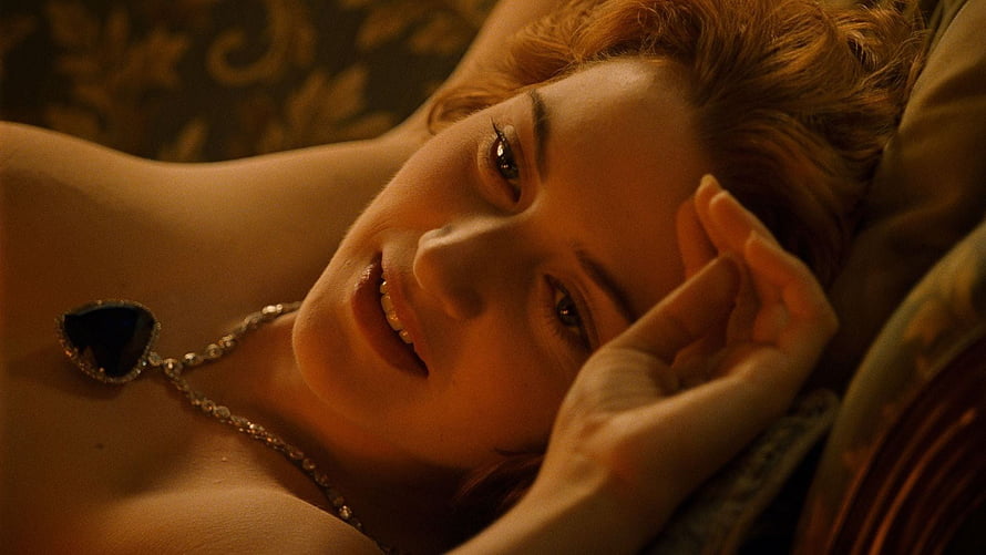 Kate Winslet as Rose DeWitt Bukater in Titanic, Lying on a Bed with a Diamond Necklace HD wallpaper
