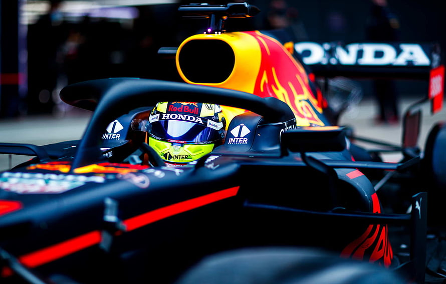 Sergio Perez in Red Bull Racing Honda Formula 1 Car on the Grid HD wallpaper