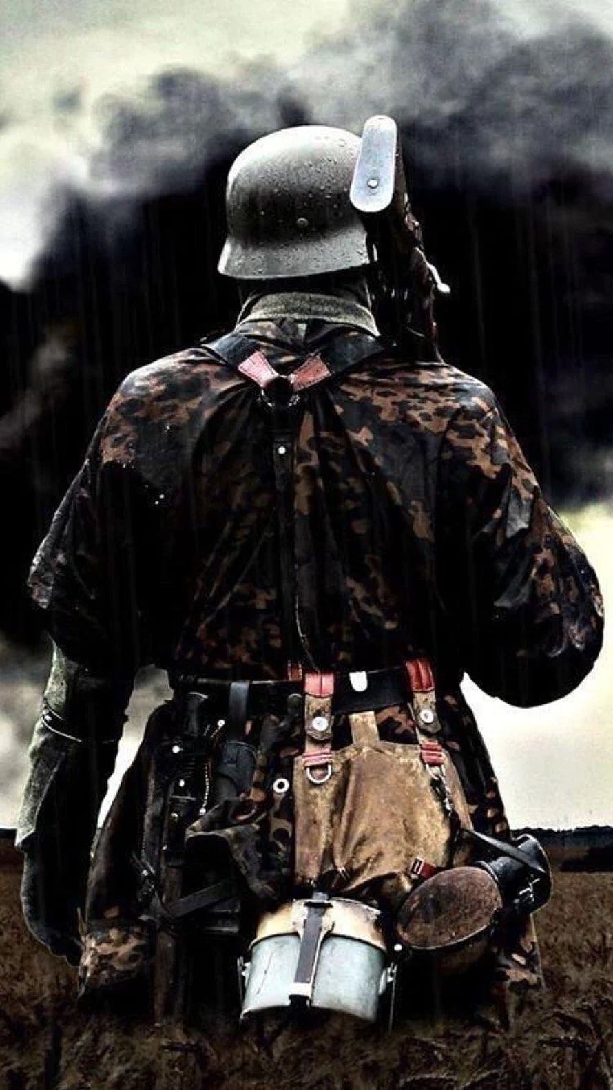 Waffen SS Soldier in Camouflage Standing in Trench with Smoke and Rain HD phone wallpaper