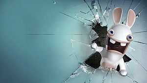 Rabbids Breaking Through Shattered Glass With Wide Open Mouth And Blue Eyes HD wallpaper