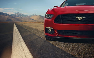 Red Ford Mustang GT Front View on Desert Highway with Mountain Backdrop HD wallpaper