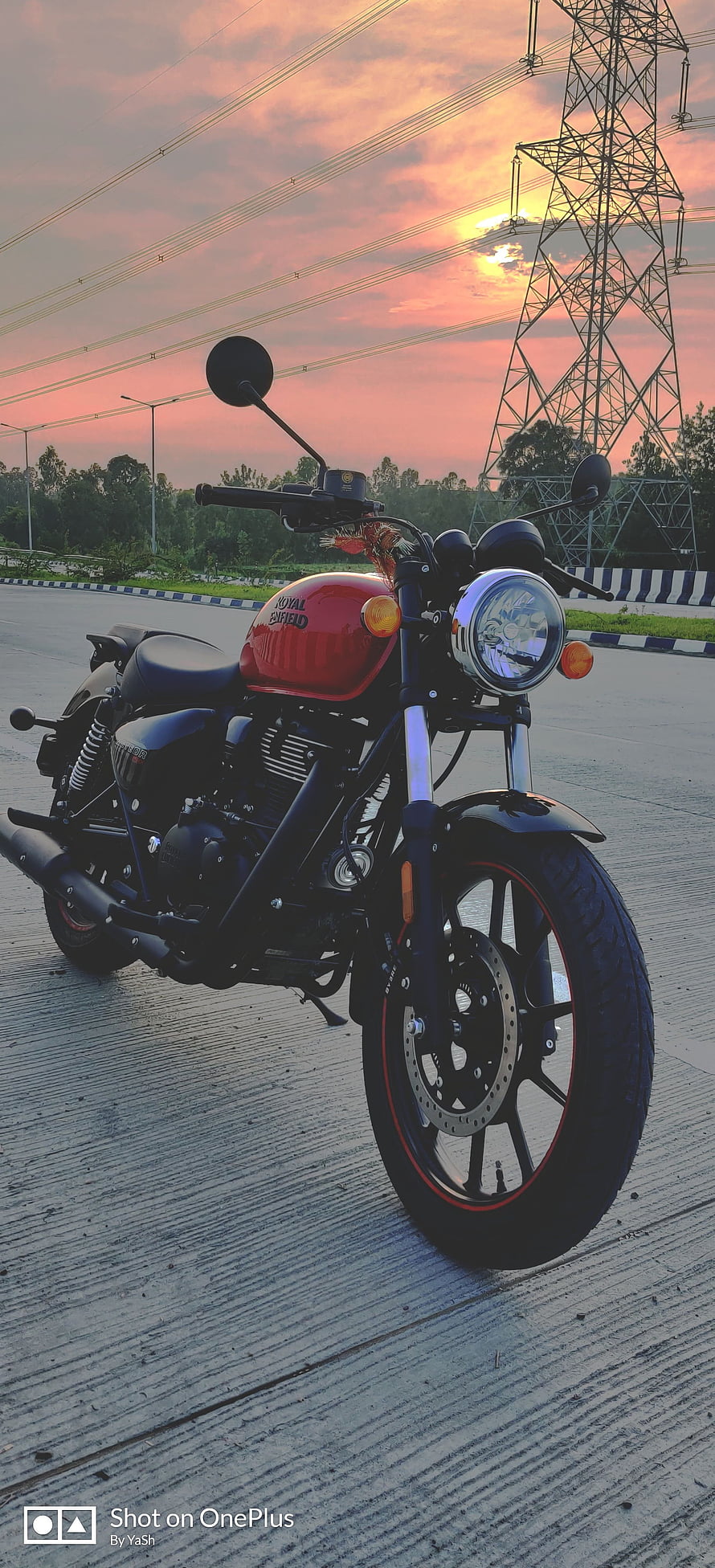 Red Royal Enfield Classic 350 Motorcycle Parked on Concrete Road at Sunset HD phone wallpaper