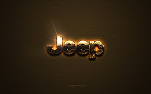 Jeep Golden Logo on Textured Brown Metal Background with Dramatic Lighting HD wallpaper