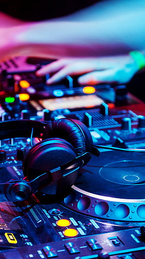 DJ Turntable and Headphones Under Neon Blue and Pink Club Lighting HD phone wallpaper