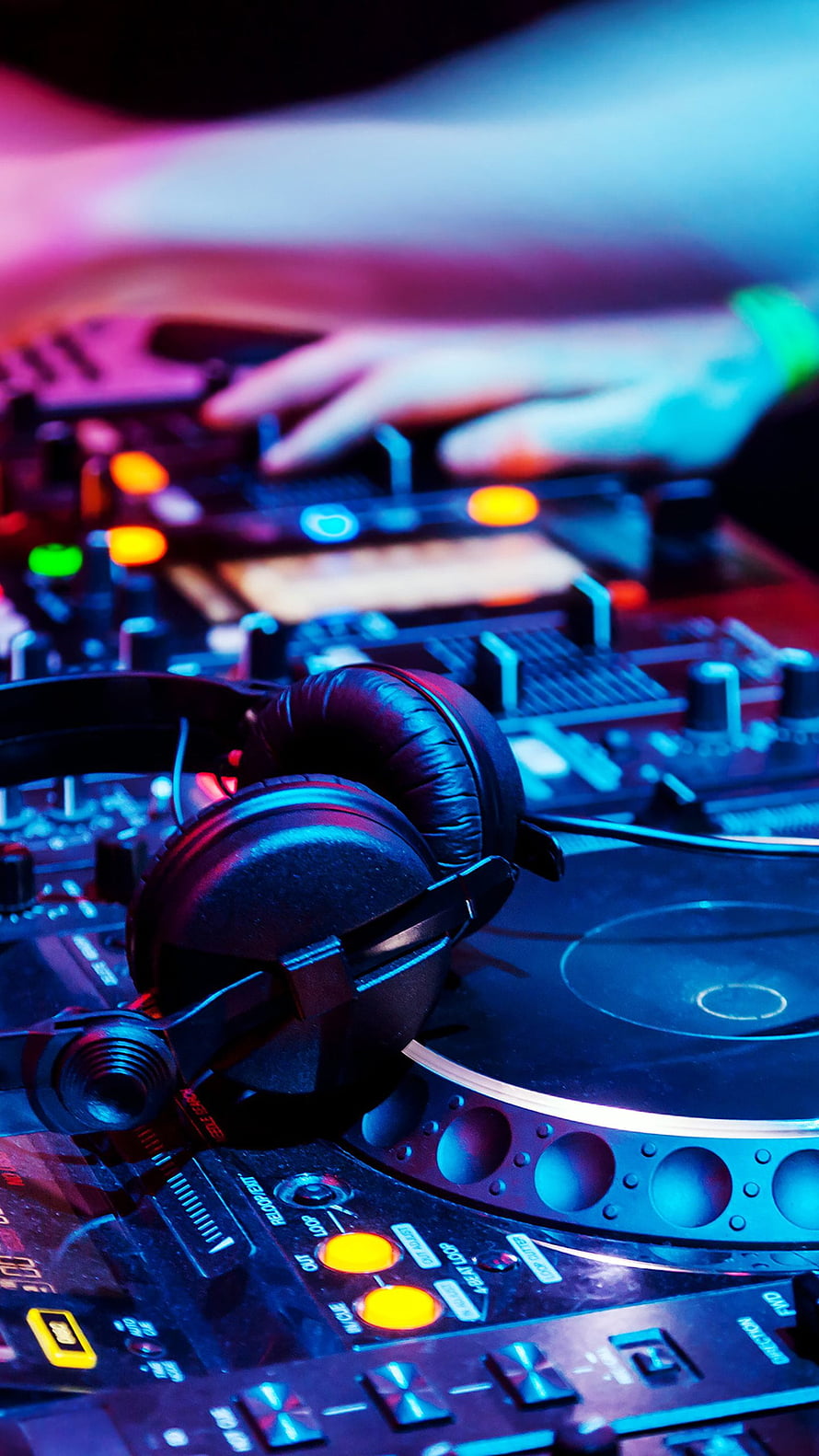 DJ Turntable and Headphones Under Neon Blue and Pink Club Lighting HD phone wallpaper