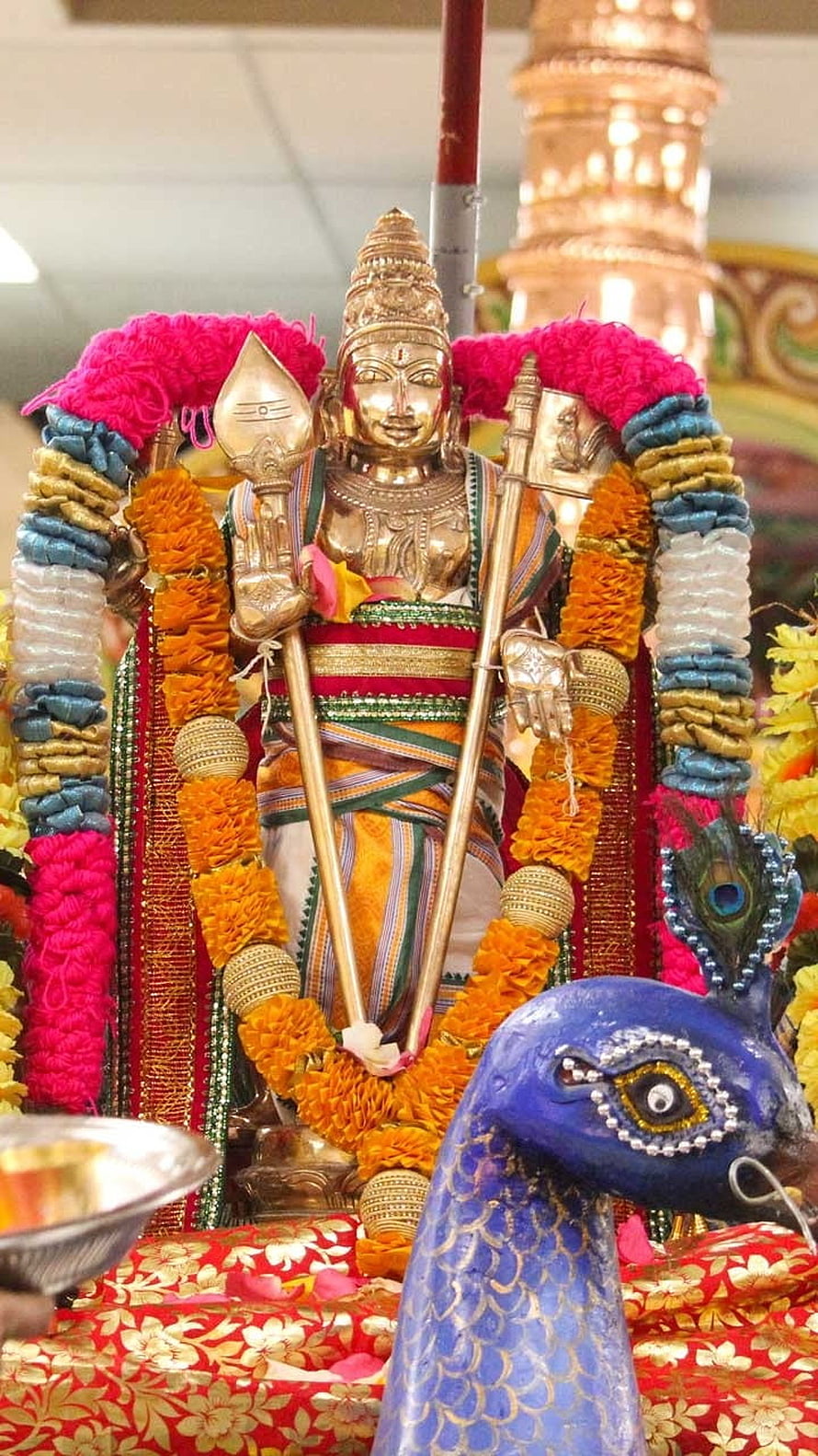 Thiruchendur Murugan Temple Deity Adorned With Marigold Garlands And Peacock HD phone wallpaper