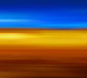 Abstract Gradient Skyline with Warm Sunset Tones and Cool Blue Horizon HD wallpaper