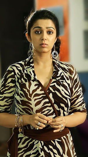 Charmi Kaur in a Brown and White Patterned Wrap Dress with Gold Jewelry HD phone wallpaper