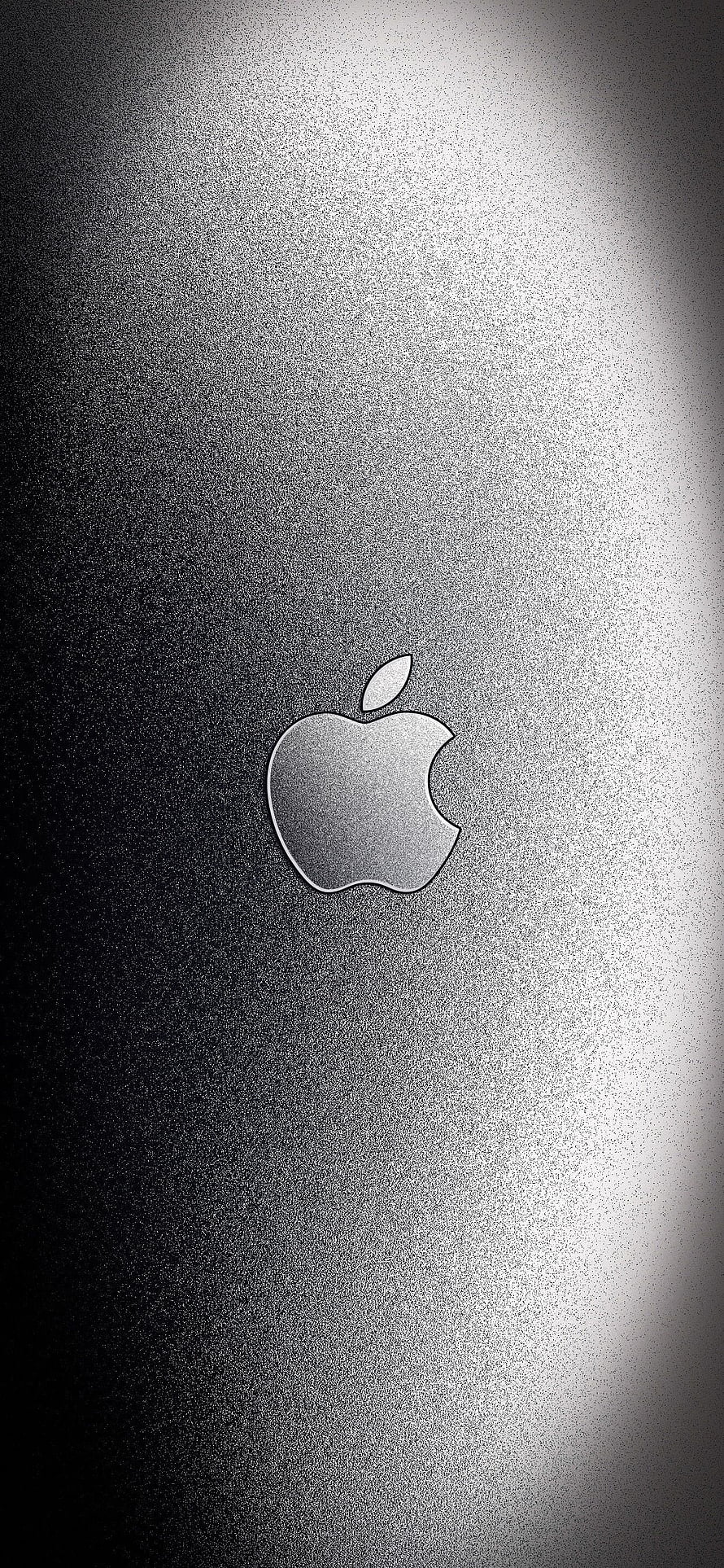 Apple Logo on Brushed Aluminum Surface with Dramatic Spotlight HD phone wallpaper