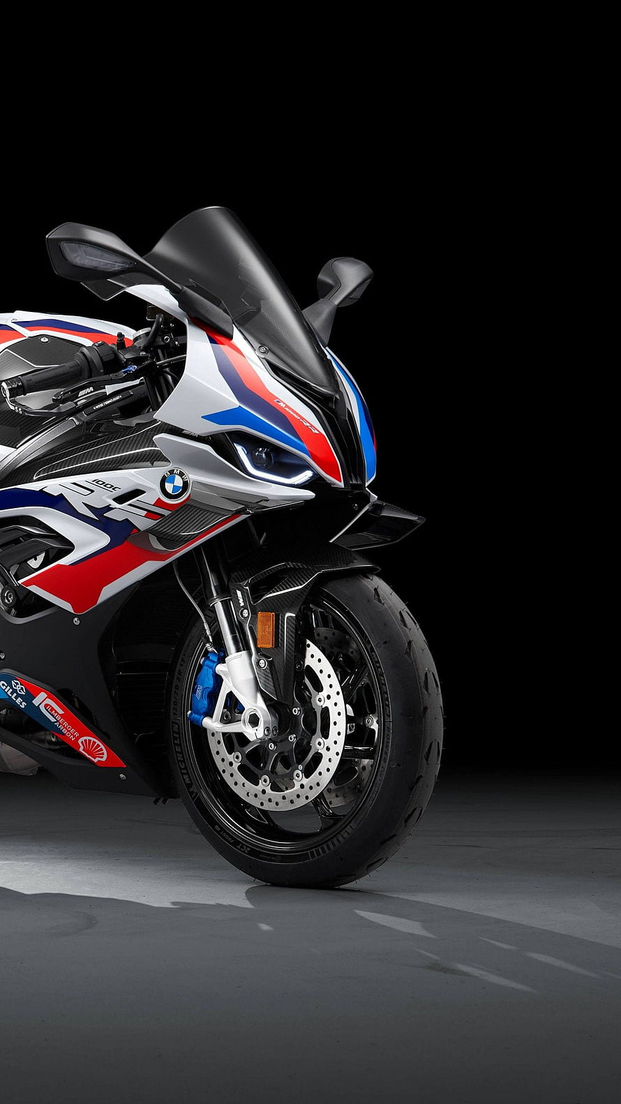 BMW M 1000 RR Superbike Front Profile with M Motorsport Livery on Black Background HD phone wallpaper