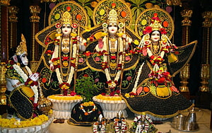 Ram Darbar Temple Shrine with Elaborate Floral Decorations and Traditional Hindu Iconography HD wallpaper