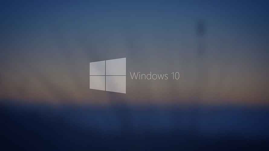 Windows 10 Default Boot Screen with Minimalist Logo on Blurred Ocean Horizon HD wallpaper
