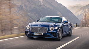 Blue Bentley Continental GT Speed Driving on a Mountain Road HD wallpaper