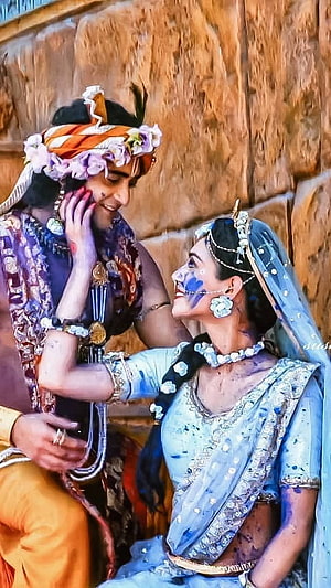 Radha Krishna in Traditional Attire During Holi Festival Celebration HD phone wallpaper