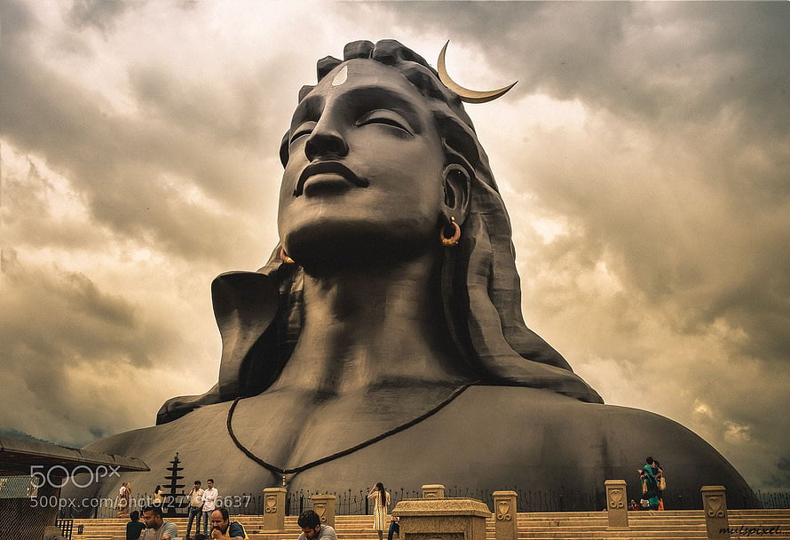 Adiyogi Shiva Statue at Isha Yoga Center Under Dramatic Stormy Sky HD wallpaper