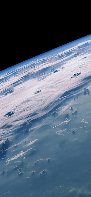 Earth From Space: Swirling Clouds and Atmospheric Glow Over the Horizon HD phone wallpaper