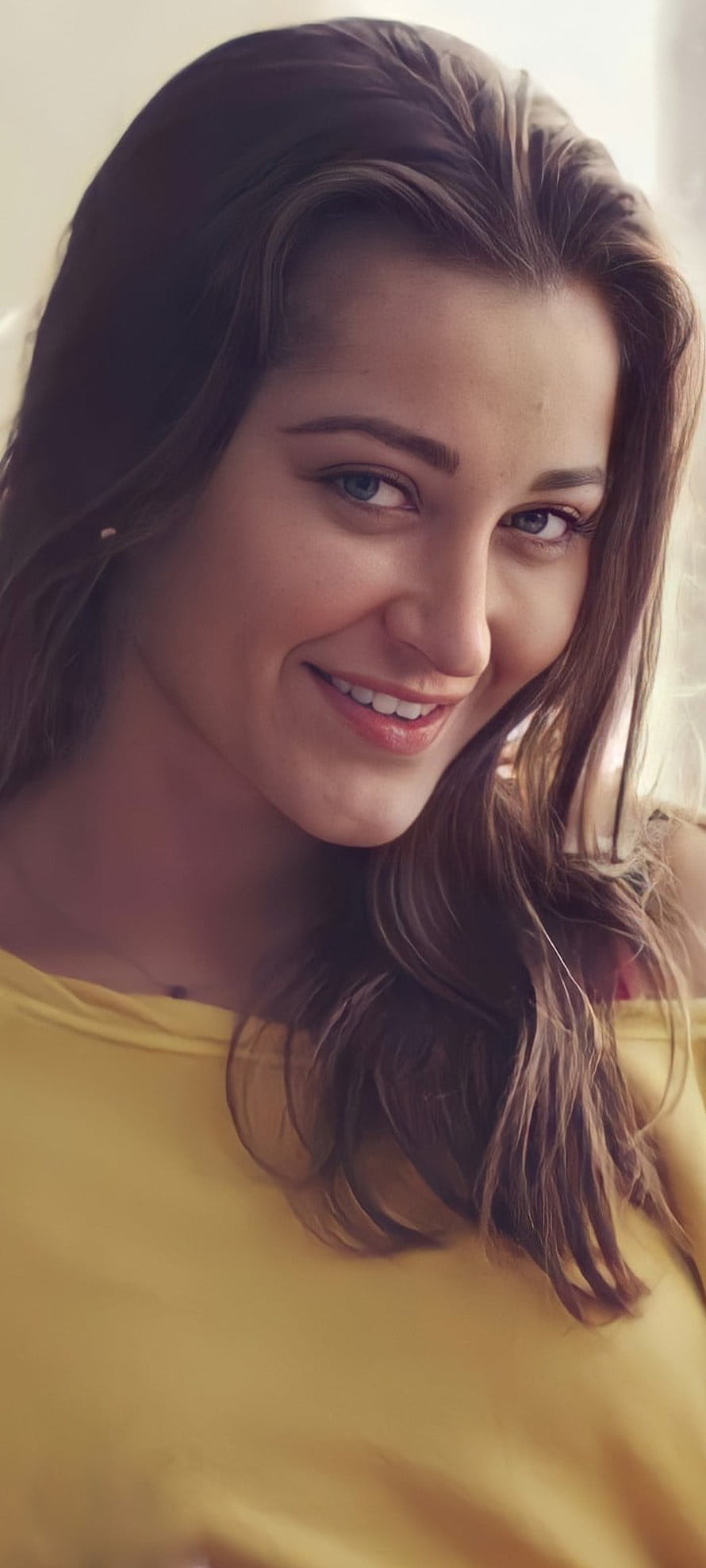Smiling Woman With Long Brown Hair Wearing A Yellow Top HD phone wallpaper