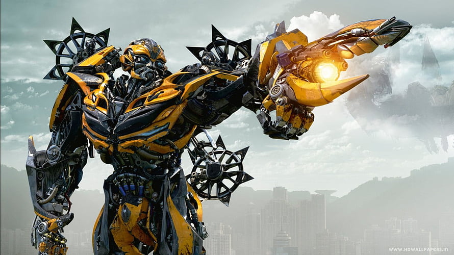Bumblebee from Transformers Age of Extinction in Combat Stance with Glowing Cannon HD wallpaper
