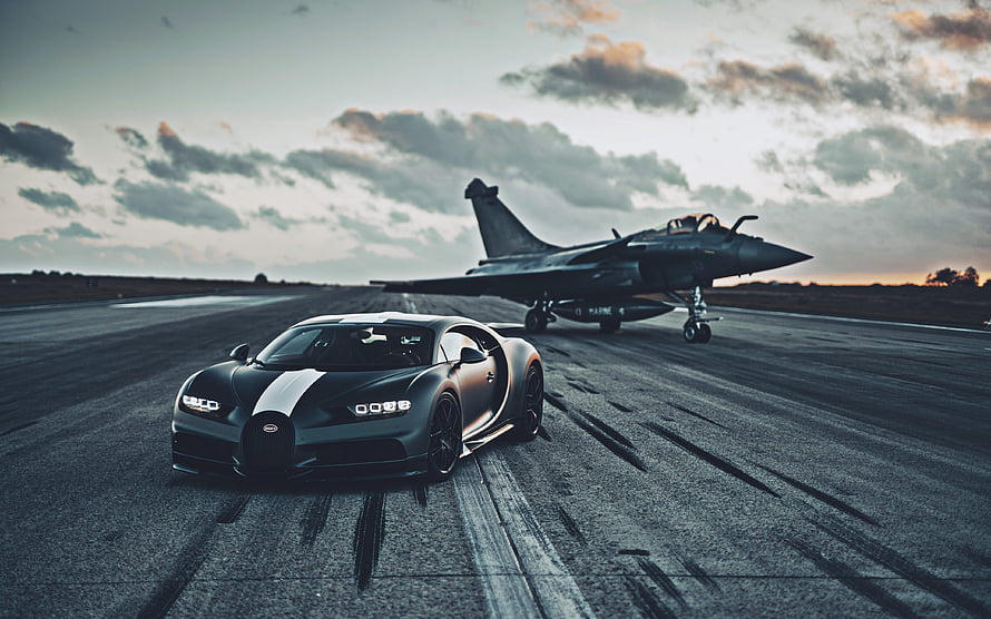 Bugatti Chiron and Dassault Rafale Fighter Jet on Airfield Runway at Dusk HD wallpaper