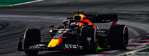 Red Bull Racing RB18 Formula 1 car on the track with driver Sergio Perez HD wallpaper