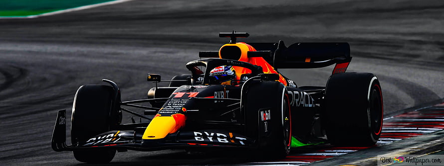 Red Bull Racing RB18 Formula 1 car on the track with driver Sergio Perez HD wallpaper