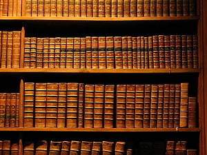 Vintage Law Library Bookshelves with Antique Leather Bound Volumes HD wallpaper