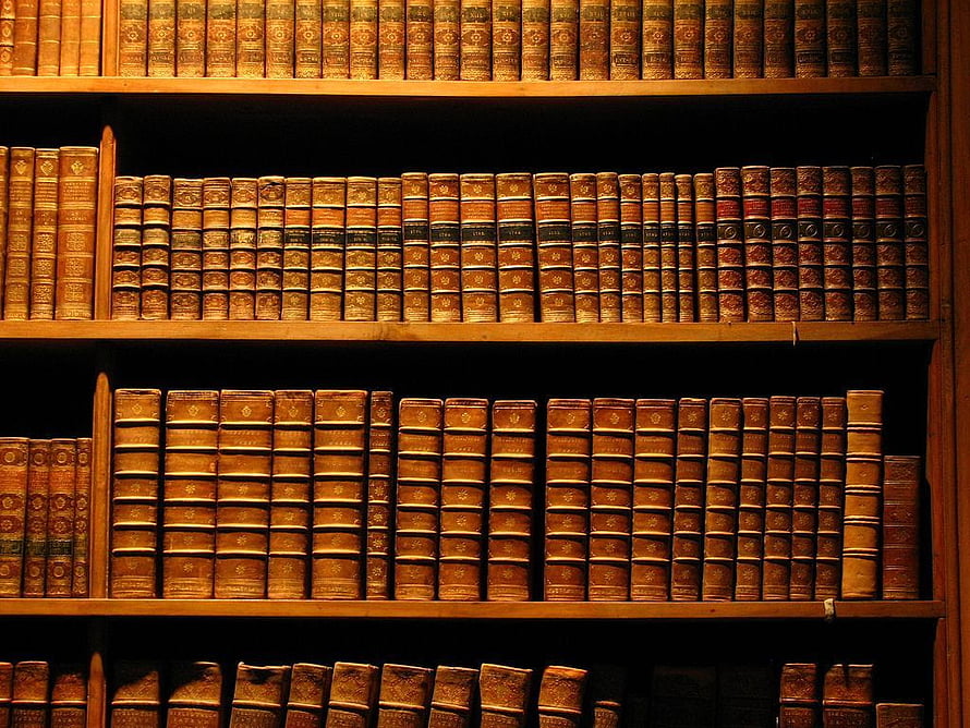 Vintage Law Library Bookshelves with Antique Leather Bound Volumes HD wallpaper
