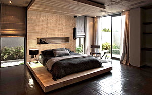 Modern Loft Bedroom With Platform Bed And Perforated Wood Accent Wall HD wallpaper