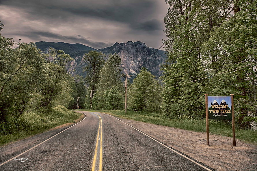 Winding Country Road Leading to Twin Peaks Mountain Under Dramatic Stormy Skies HD wallpaper