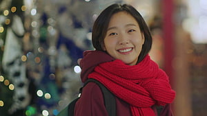 Ji Eun Tak from Goblin Korean Drama in a Red Knit Scarf with Festive Background HD wallpaper