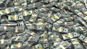 Piles of Bundled US Hundred Dollar Bills Scattered in a Wealthy Money Mountain HD wallpaper