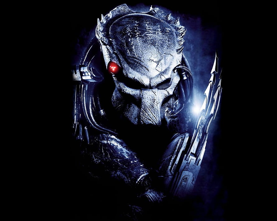 Predator Alien Hunter with Glowing Red Eye and Wrist Blades in Dark Atmosphere HD wallpaper