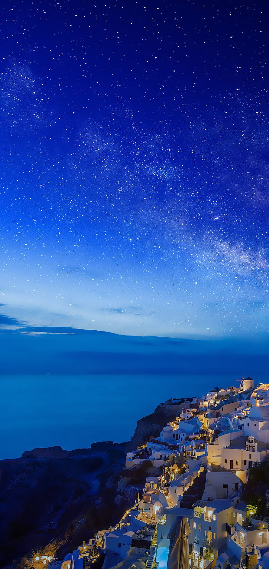 Santorini Cliffside Village Under a Starry Night Sky with the Milky Way HD phone wallpaper