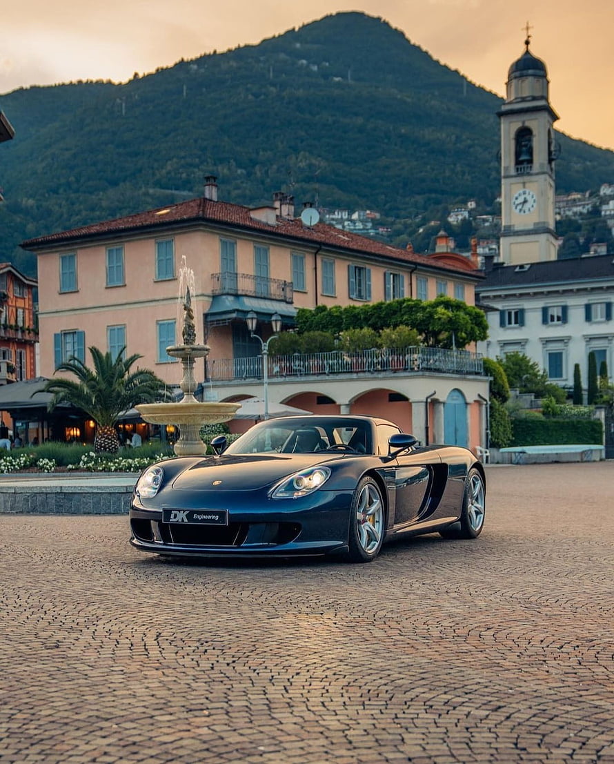 Porsche Carrera GT Super Car Parked in Italian Town Square at Sunset HD phone wallpaper