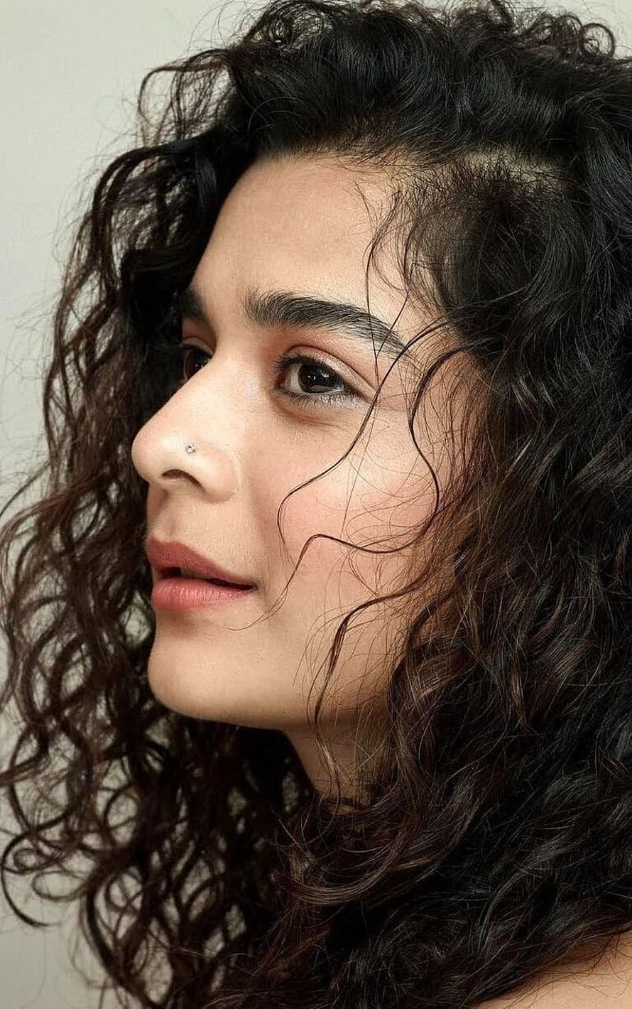 Mithila Palkar Profile Portrait With Curly Hair And Nose Stud HD phone wallpaper