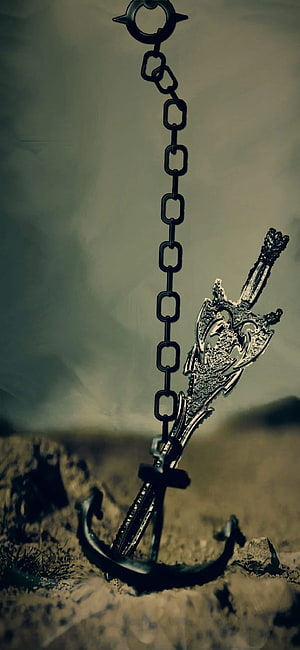 Ornate Gothic Sword Planted in Earth with Hanging Chain and Cross HD phone wallpaper