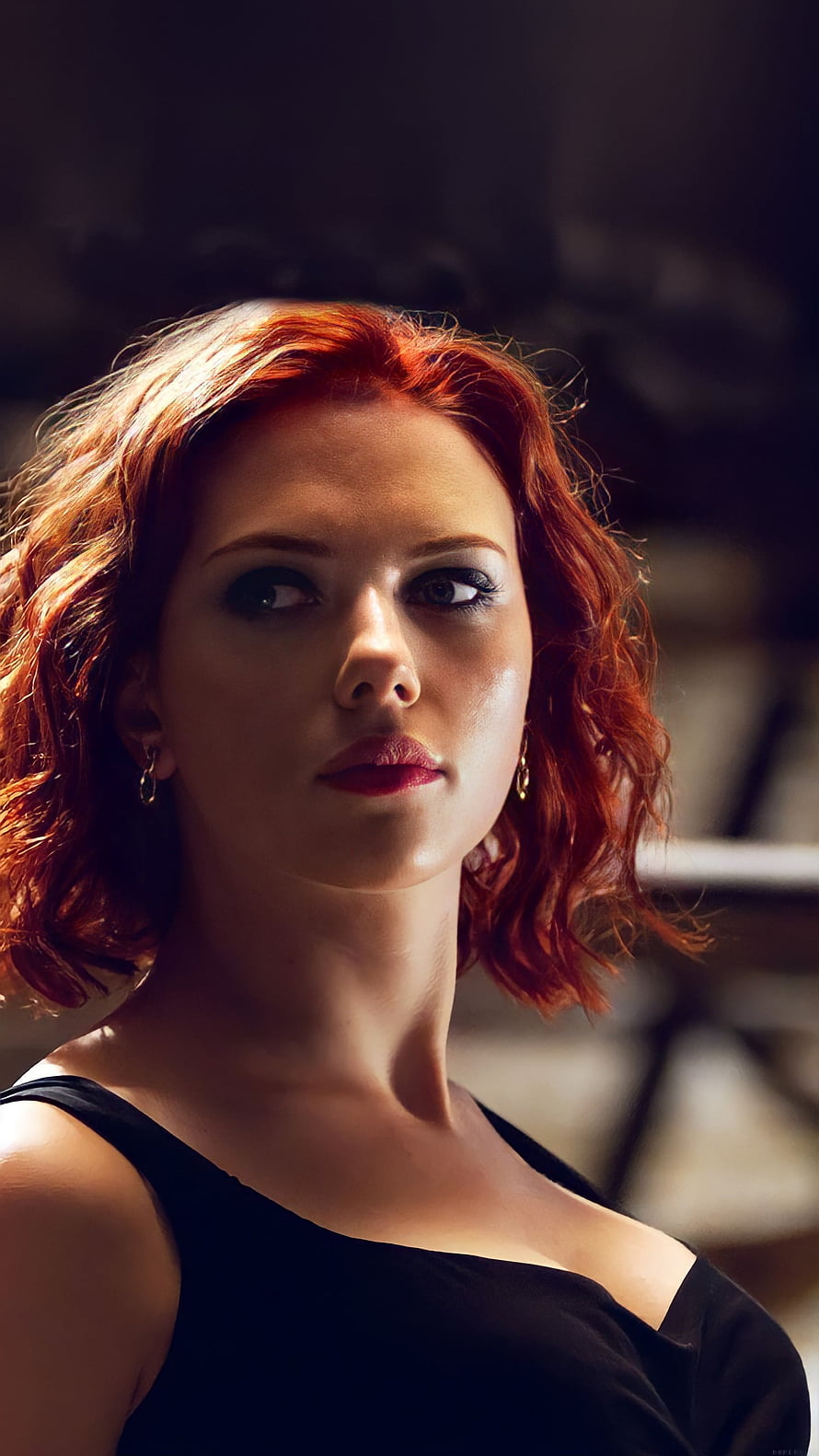 Scarlett Johansson as Black Widow in a dramatic close-up portrait with red hair and dark attire HD phone wallpaper