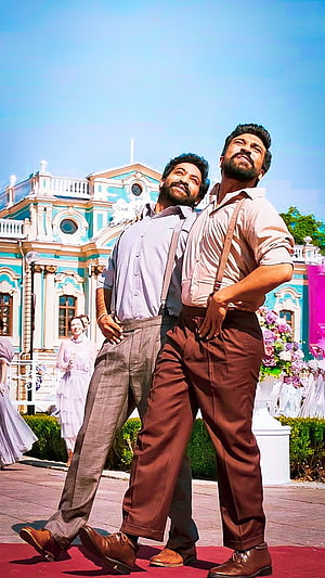 RRR Movie Still Featuring NTR and Ram Charan in Vintage Suits Walking on a Red Carpet HD phone wallpaper