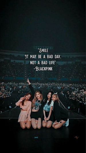 Blackpink K-Pop Group Kneeling on Stage with Stadium Crowd and Inspirational Quote HD phone wallpaper