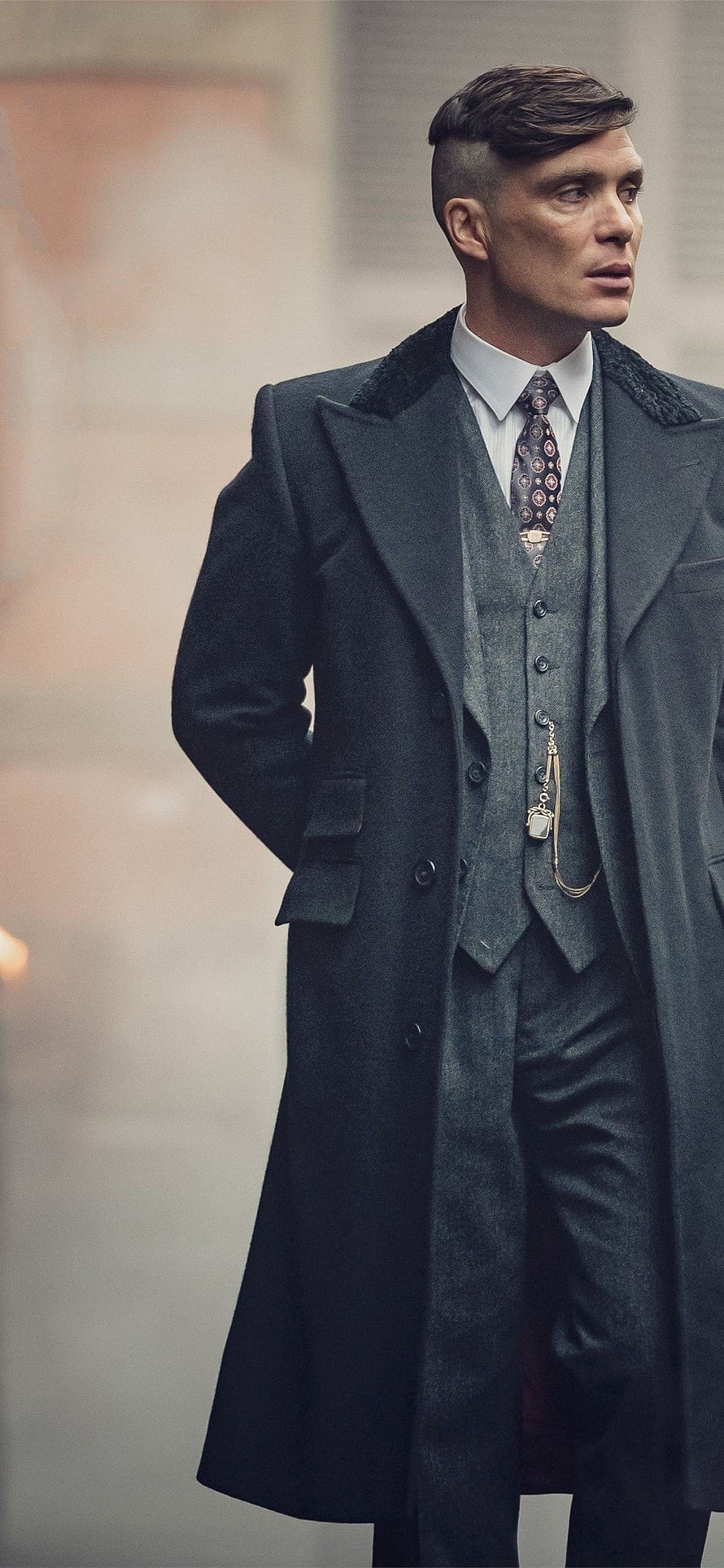 Tommy Shelby in a dark overcoat and waistcoat from Peaky Blinders HD phone wallpaper